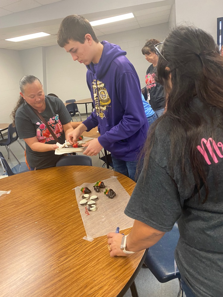 students with homemade Valentine’s Day treats