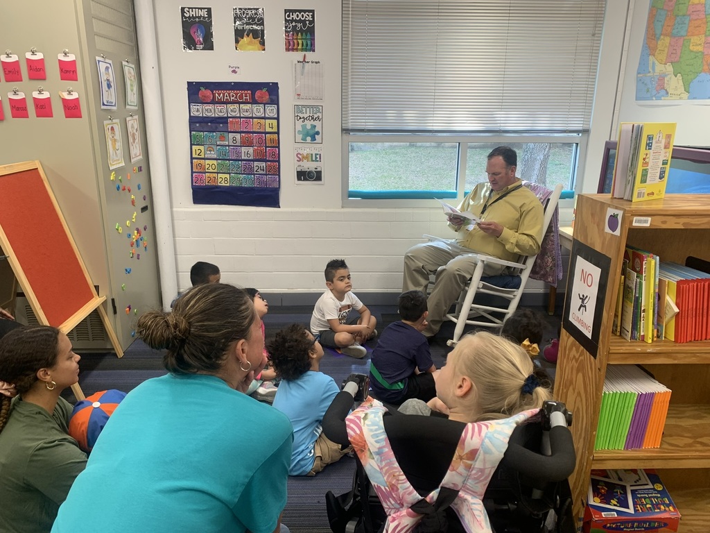 Mr. Appelt reading to students